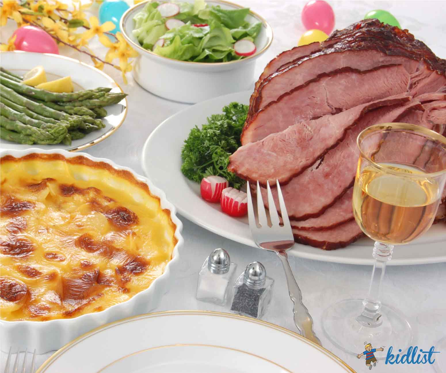 A traditional Easter dinner with ham and side dishes.
