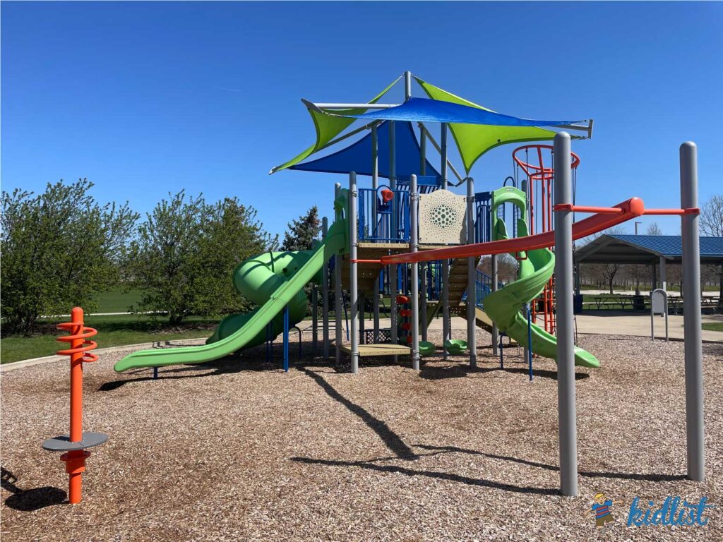Playground at Frontier Park in Naperville with a play structure, gliding bar, and more.