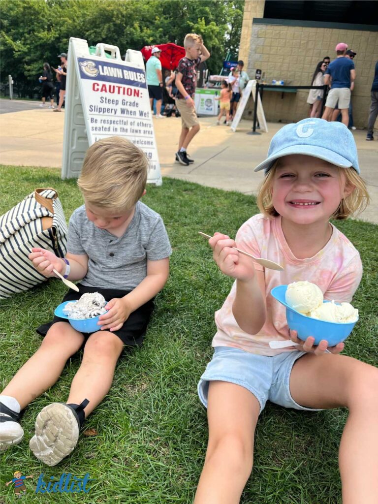 two young kids eating ice cream at the Cougars baseball game. Not sure if this particular ice cream order would be part of the all-you-can-eat package, but ice cream cups are listed!